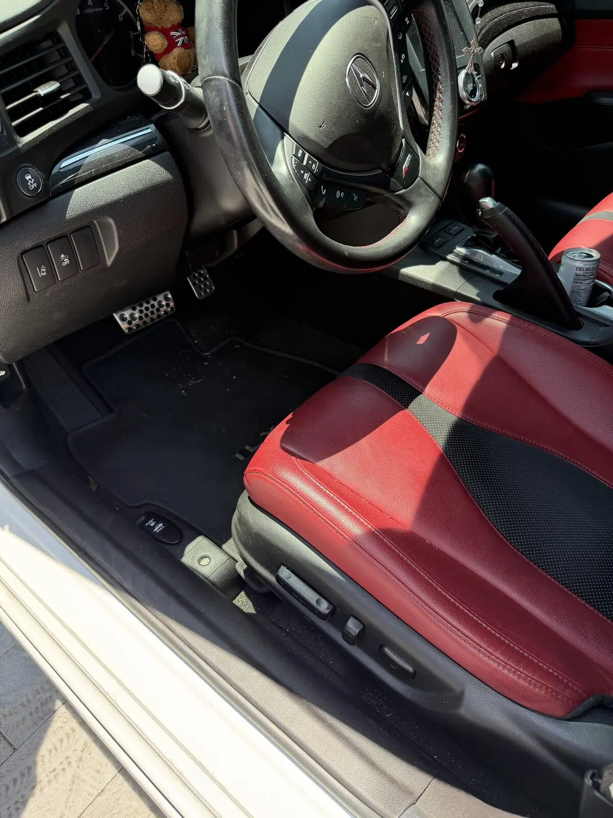 White Acura ILX driver floor — before