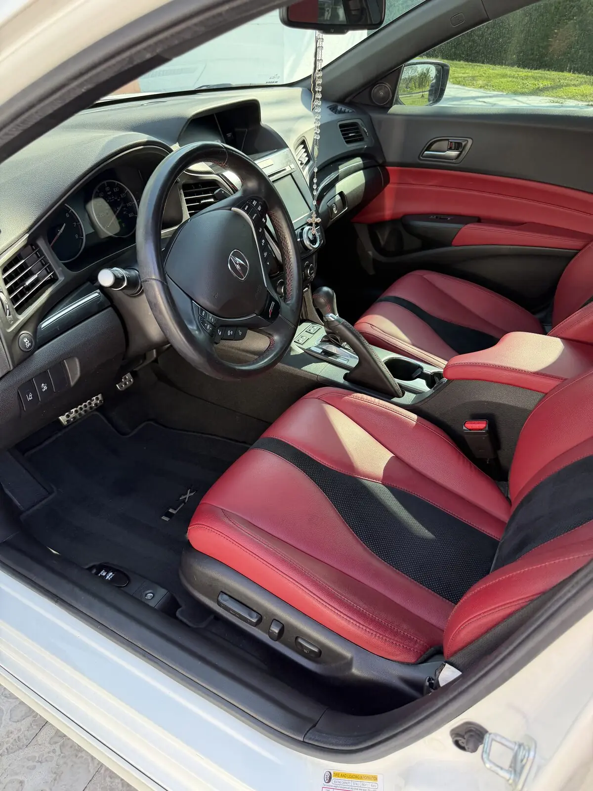 White Acura ILX driver floor — after