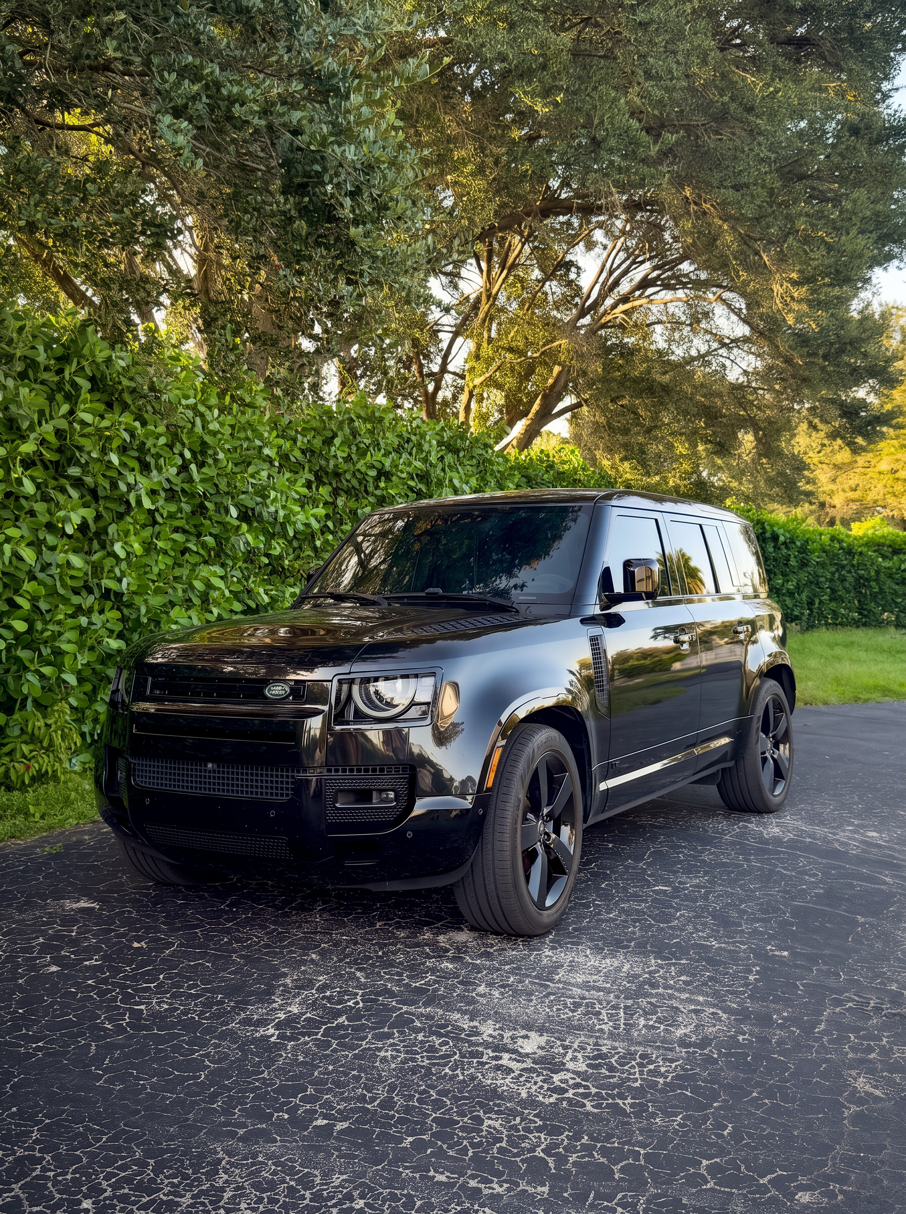 Freshly detailed black Land Rover Defender by S.H. Auto Detail